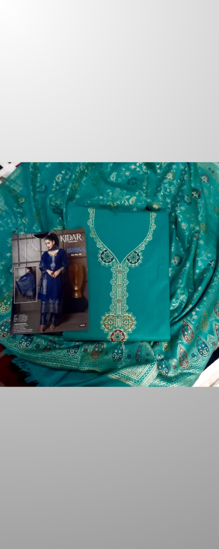 Green coloured woven Kani embroided suit 1045