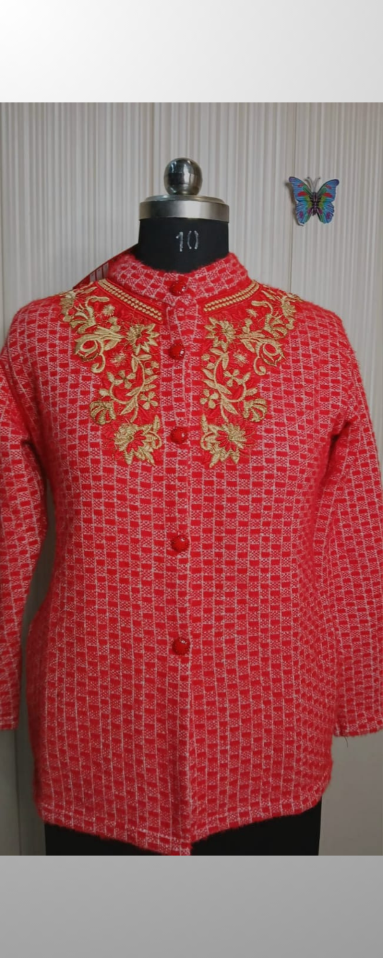 Red Woolen cardigans with embroidery work.