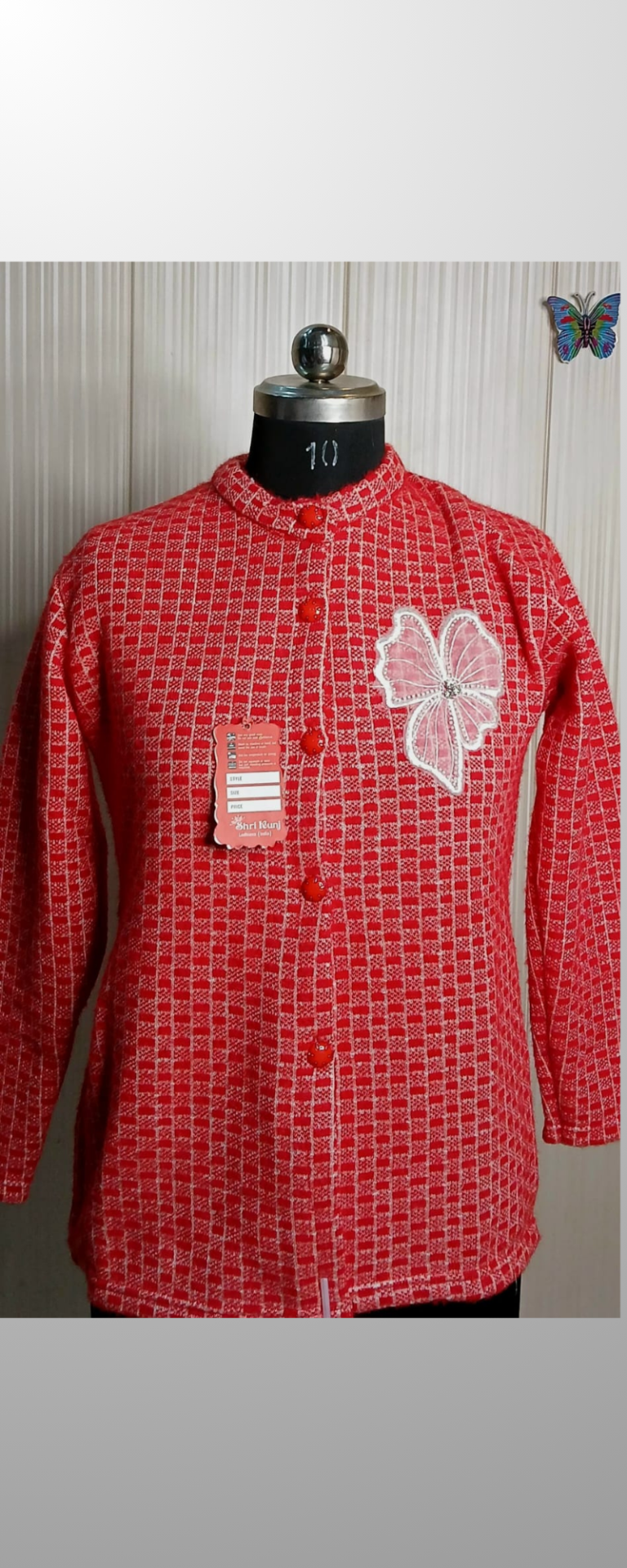 Red Woolen cardigans with embroidery work.