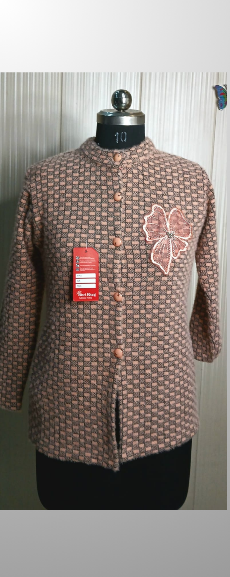 Pink Woolen cardigans with embroidery work.