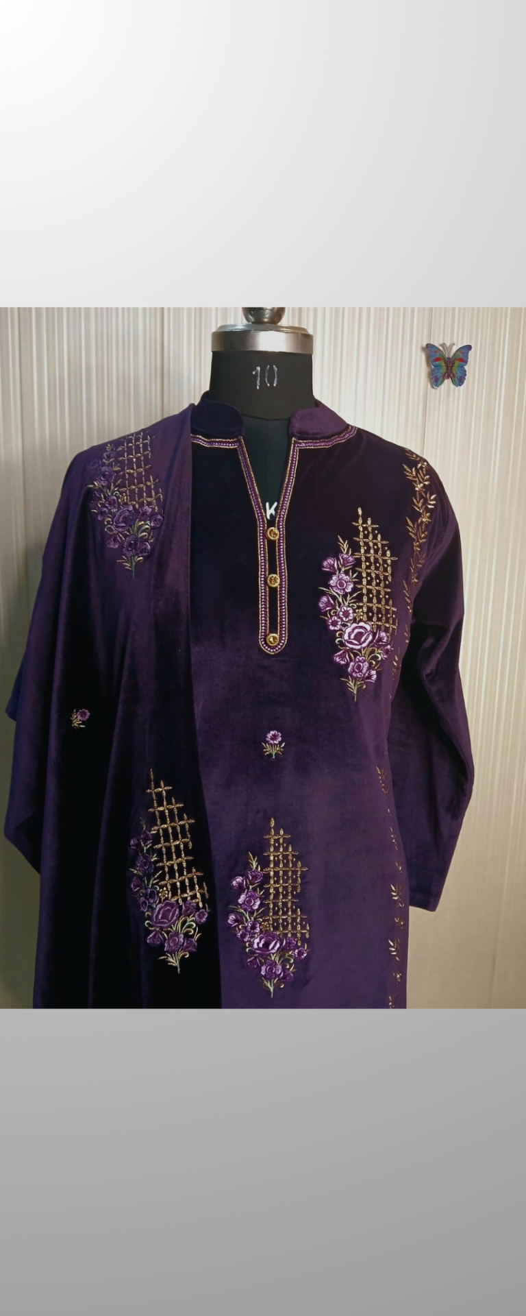 Purple Embroided heavy velvet suit with heavy stole work and bottom .